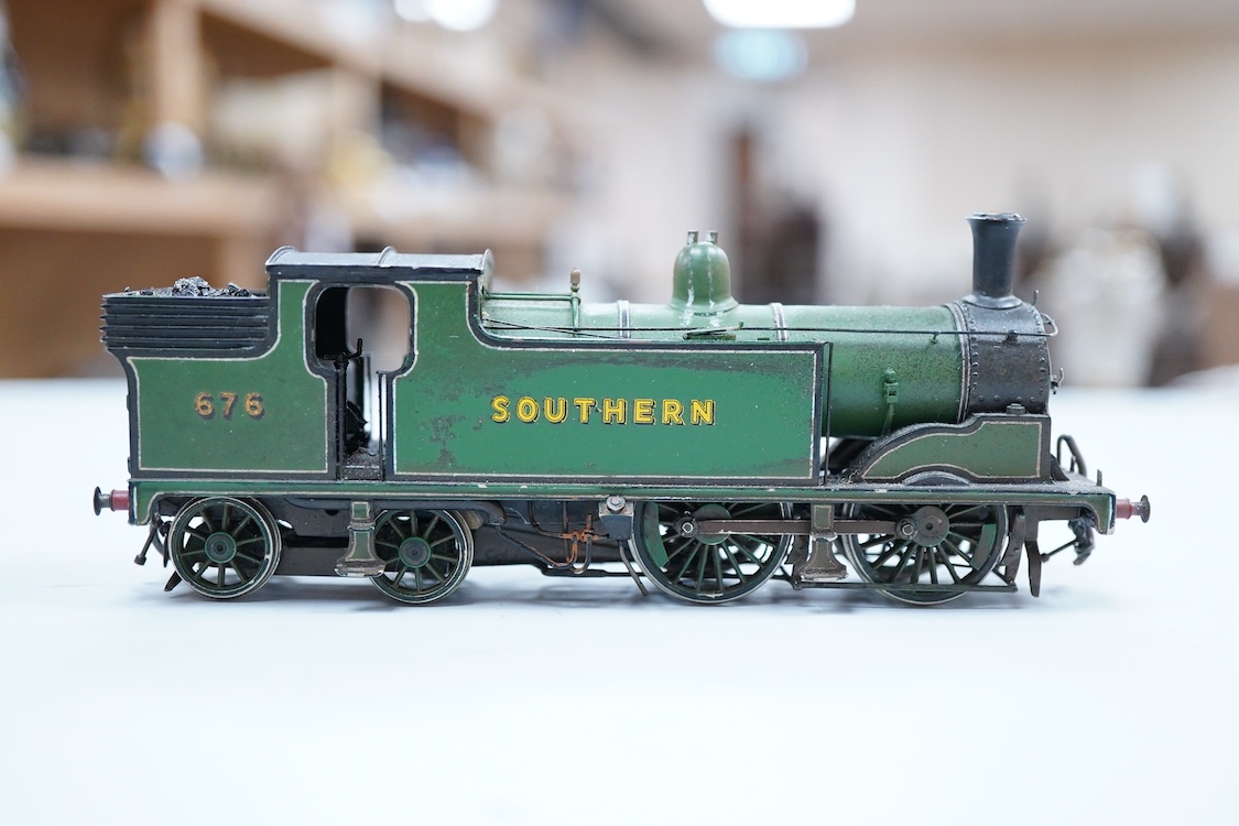 An EM gauge scratch built model railway locomotive by John Worsley, a Southern Railway Drummond M7 0-4-4T, 676, a detailed model with opening smoke box door showing the details of the blast pipe and boiler tube ends, spr